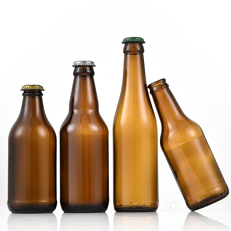 Wholesale Most popular clear drink 250ml 330ml transparent glass beer bottle with crown lid