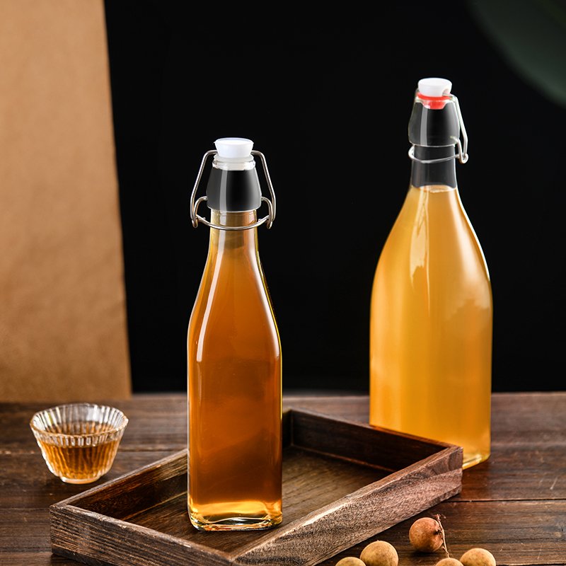 Glass bottle factory 250ml 500ml 750ml 1000ml empty transparent swing top glass liquor Swing Top Glass Bottles