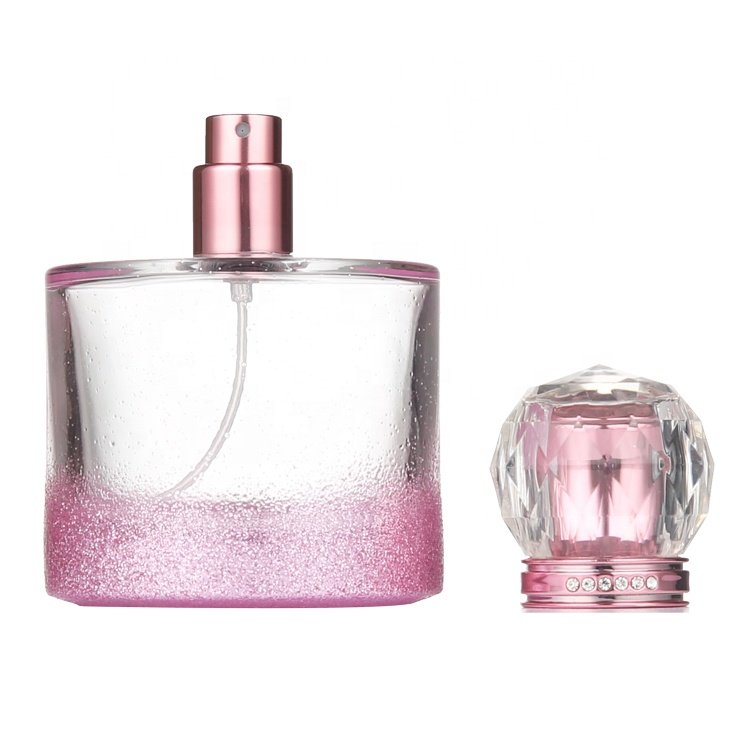 Wholesale 50ml 80ml 100ml Cosmetic Pink Cylindrical Empty Refillable Clear Glass Perfume Bottle With Pump