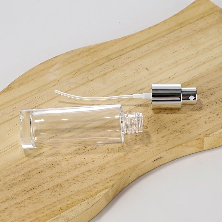 Elegant Clear Glass Perfume Spray Bottles with Luxurious Gold Lids and Print Options