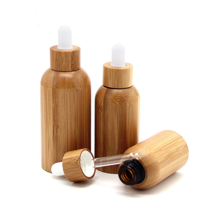 High quality 5ml 10ml 15ml 20ml 30ml 50ml 100ml essential oil glass bottle with dropper for cosmetic liquid oil bamboo bottle