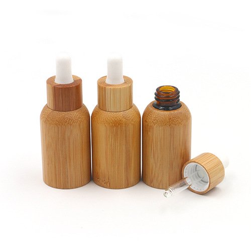 High quality 5ml 10ml 15ml 20ml 30ml 50ml 100ml essential oil glass bottle with dropper for cosmetic liquid oil bamboo bottle
