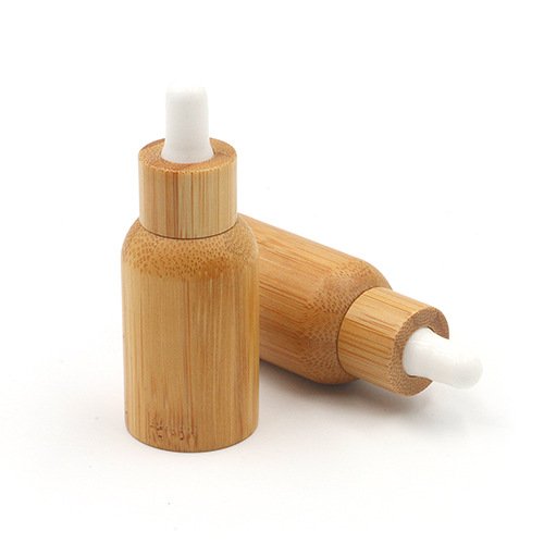 High quality 5ml 10ml 15ml 20ml 30ml 50ml 100ml essential oil glass bottle with dropper for cosmetic liquid oil bamboo bottle