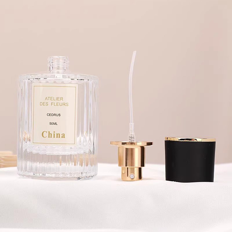 Refillable Perfume Bottle Packaging Custom Luxury clear 50ml 100ml perfume spray glass bottle with box