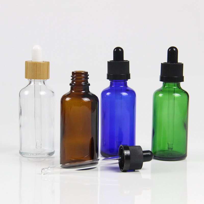 Custom 1oz 10ml 30ml 50ml 100ml luxury clear oil glass round cosmetic dropper bottle 2 oz 60ml