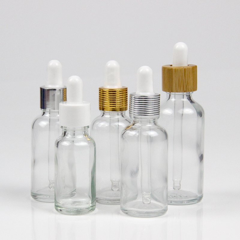 Custom 1oz 10ml 30ml 50ml 100ml luxury clear oil glass round cosmetic dropper bottle 2 oz 60ml