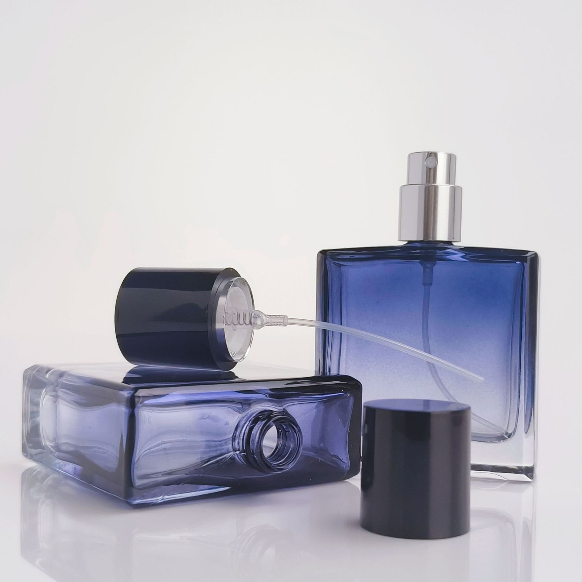 Factory price wholesales 30ml 50ml 100ml clear transparent cosmetic perfume spray glass bottle with pump sprayer