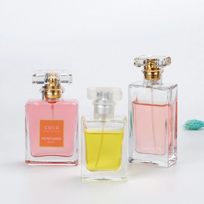 High quality Fea20mm for100ml perfume glass bottle with shiny gold perfume pump spray cap
