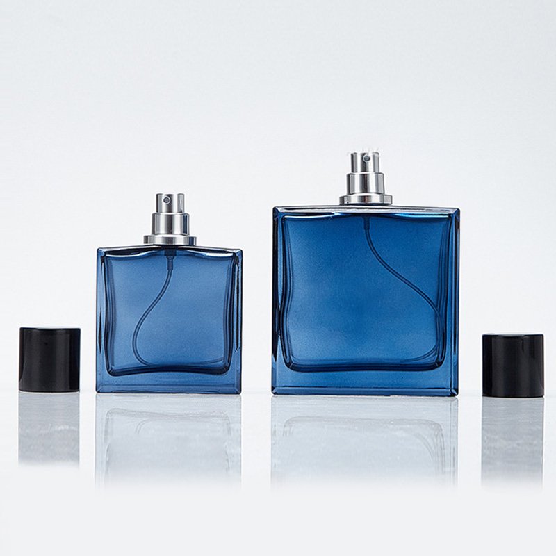 Wholesale 50ML 100ml Square Perfume Glass Bottle Transparent Blue Spray Curly Empty Bottle with Black Cylinder Cap
