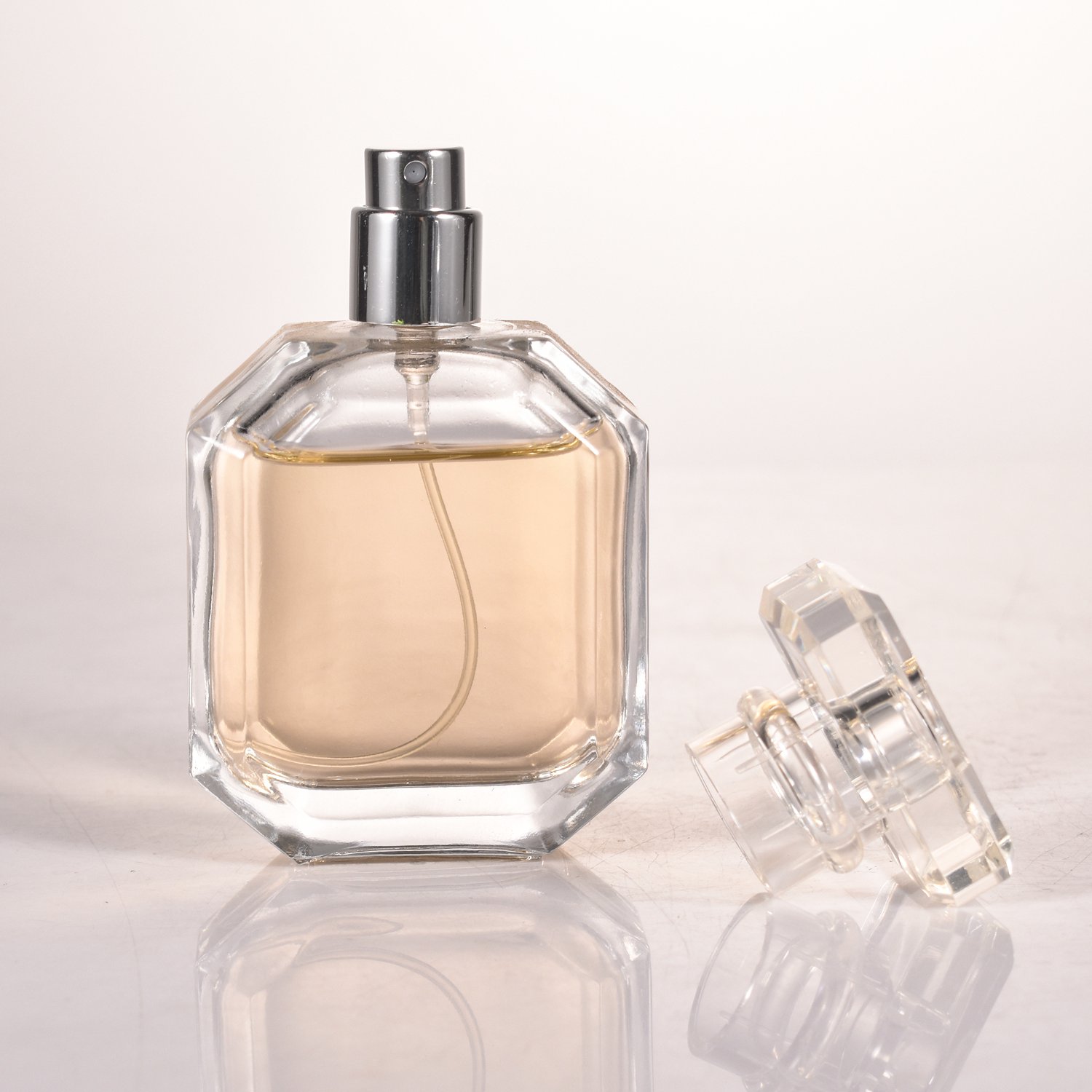 Wholesale flat square 30ml 50ml 100ml empty glass perfume bottle mens crimp top perfume bottle package with acrylic spray lids