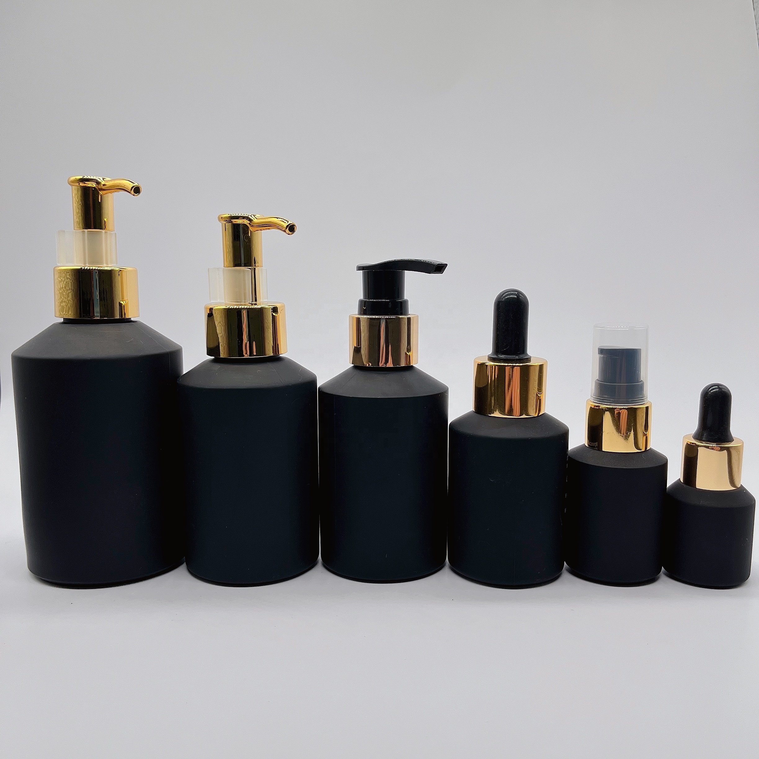 Cosmetic packaging 15ml-100g matte black slant shoulder glass bottle with gold lid/pump/dropper lotion bottle cream jar sets