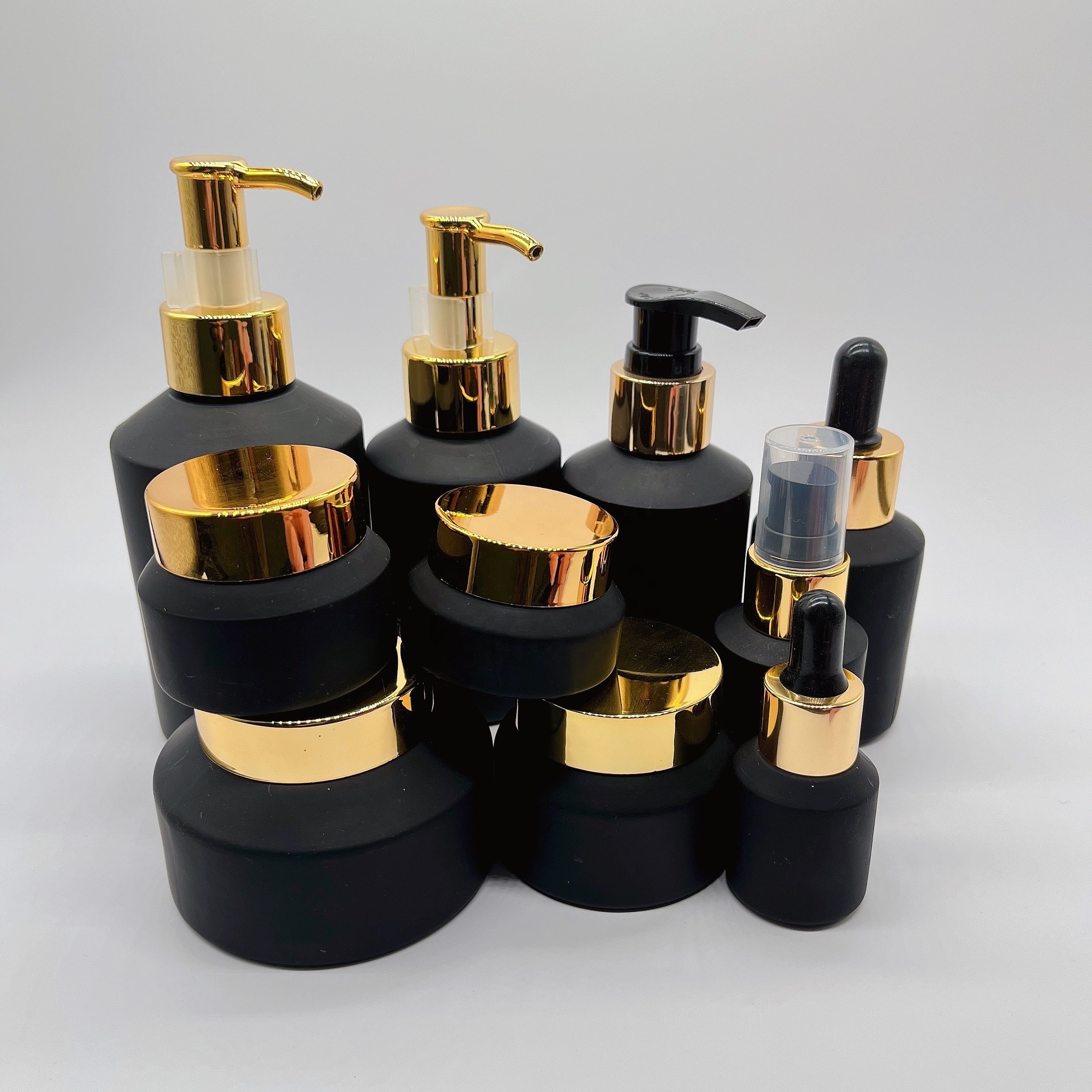 Cosmetic packaging 15ml-100g matte black slant shoulder glass bottle with gold lid/pump/dropper lotion bottle cream jar sets
