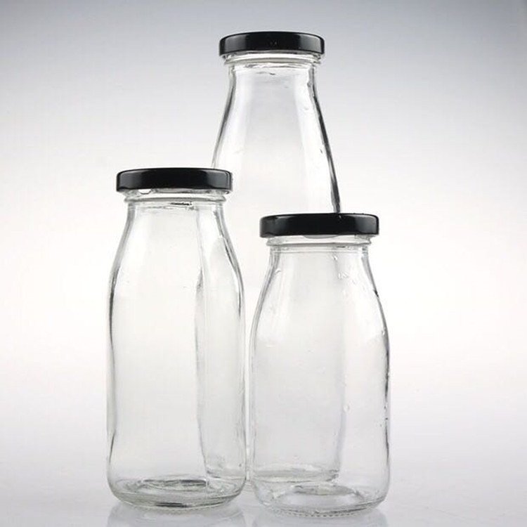 Wholesale sale transparent glass milk bottles of various sizes 100ml 200ml 250ml 500ml 1L