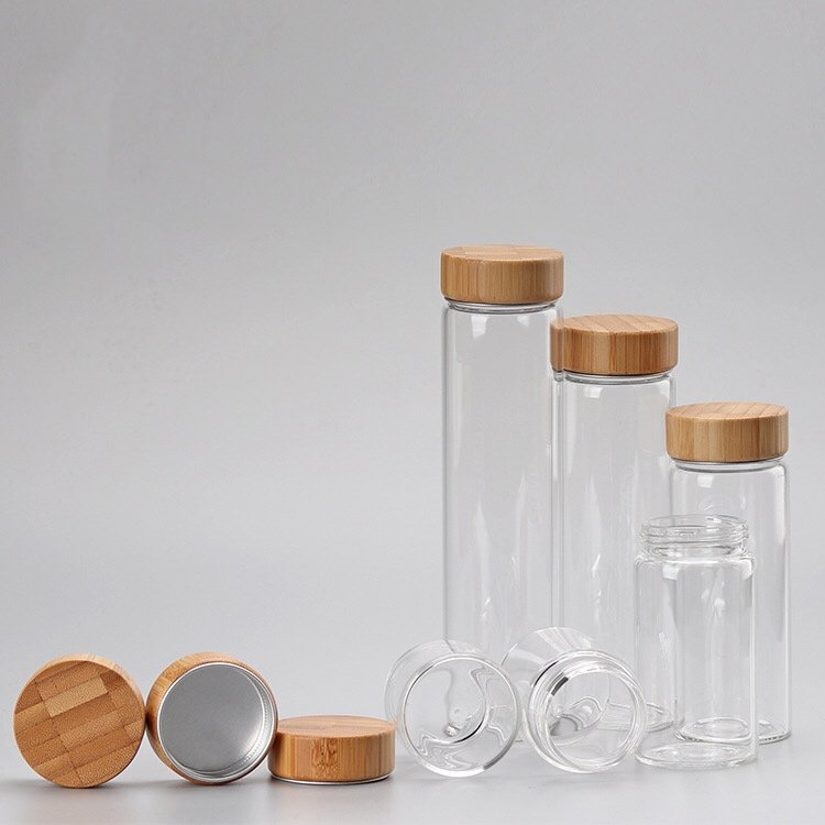 Wholesale 5ml to 200ml Bamboo Lid Storage Packaging Beverage Glass Bottle Jar Bamboo Screw Cap