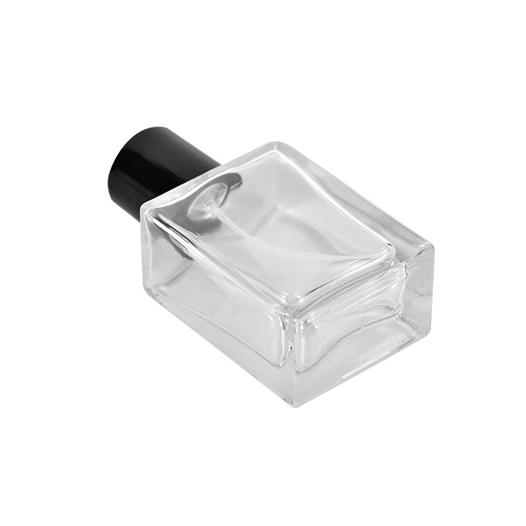 Wholesale Square Glass Perfume Bottle Flat 50ml 100ml Clear Perfume Bottle With Spray Lid