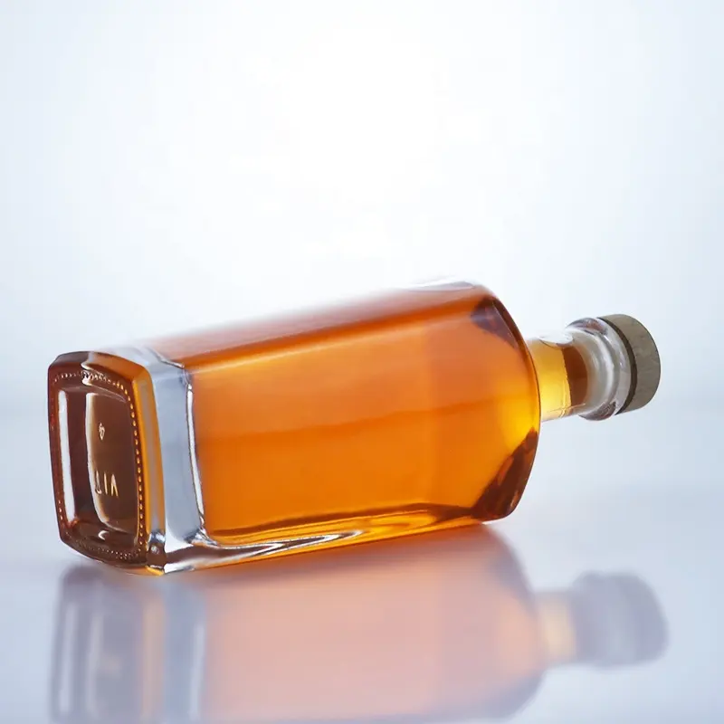 Custom 700ml 750ml clear square rum vodka liquor brandy glass bottle whiskey tequila gin glass bottle with synthetic cork