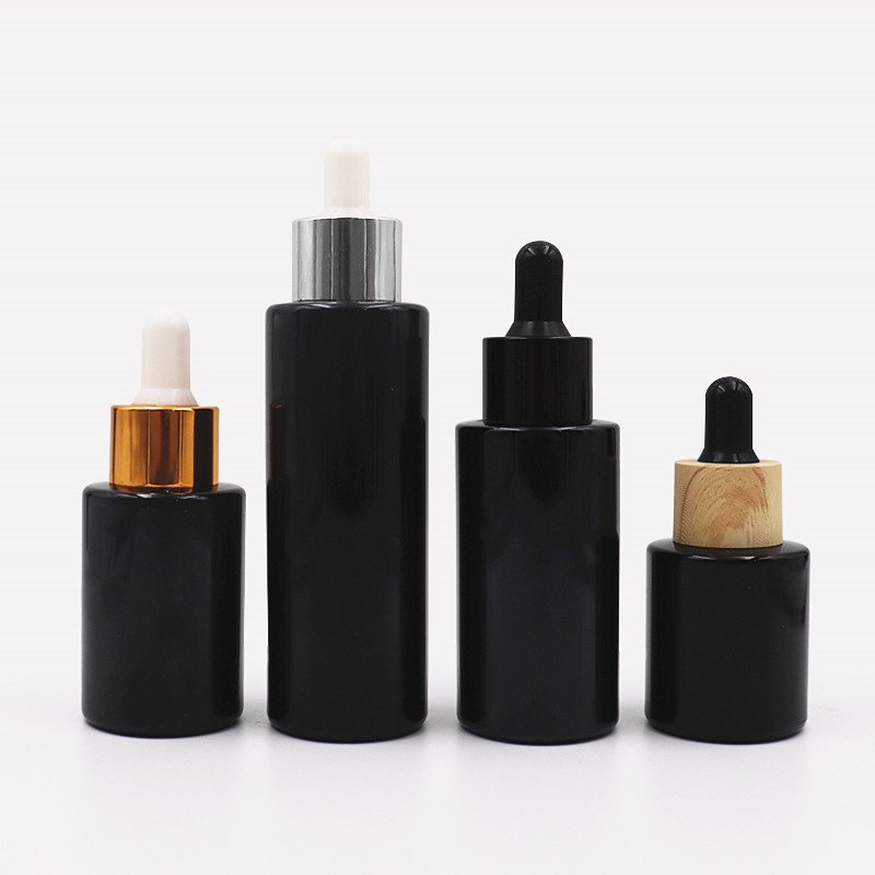 Hot sell OEM 20ml 30ml 40ml 60ml black glass dropper bottle skin care dropper bottle with box packaging