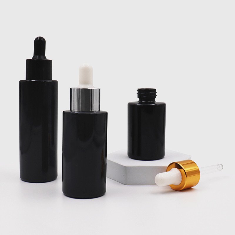 Hot sell OEM 20ml 30ml 40ml 60ml black glass dropper bottle skin care dropper bottle with box packaging