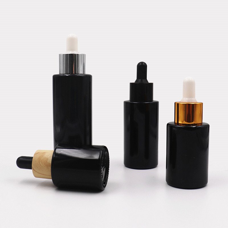 Hot sell OEM 20ml 30ml 40ml 60ml black glass dropper bottle skin care dropper bottle with box packaging