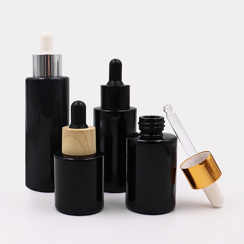Hot sell OEM 20ml 30ml 40ml 60ml black glass dropper bottle skin care dropper bottle with box packaging