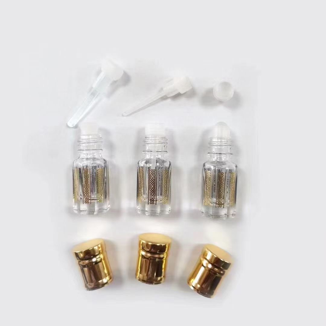 Cosmetic Packaging Body Hair Oil Bottles Roll On Perfume Attar Oud Glass Bottle with gold lid In Dubai
