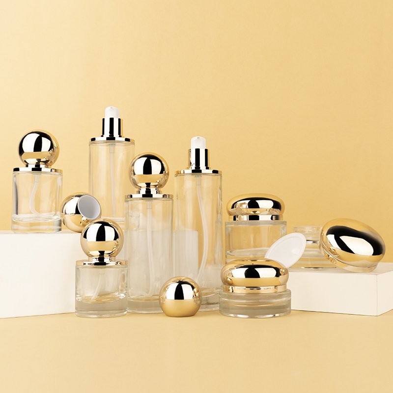 Ball shape glass cosmetic container 30ml/60ml/100ml/120ml/ pump lotion Essential Oil Glass jar with gold lid Glass bottle set