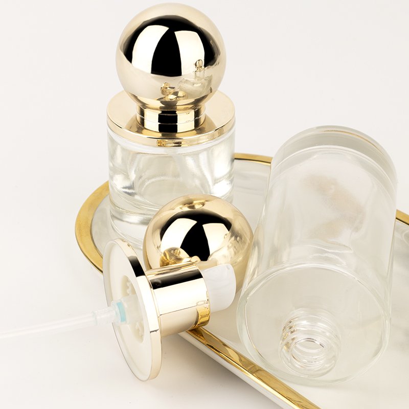 Ball shape glass cosmetic container 30ml/60ml/100ml/120ml/ pump lotion Essential Oil Glass jar with gold lid Glass bottle set