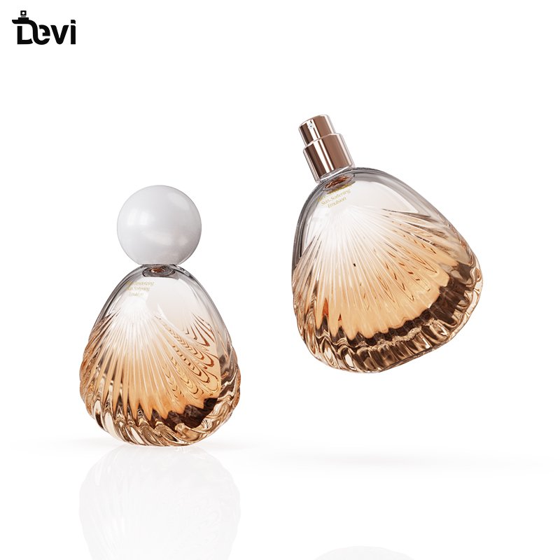 Devi Wholesale100ml luxury class cap empty round fancy perfume glass bottle for sale elegant perfume bottles