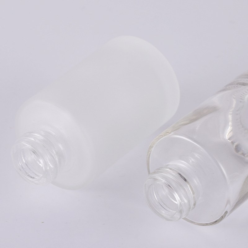 hot sale customized 30ml transparent frosted lotion cylinder essential oil dropper glass bottle with lid