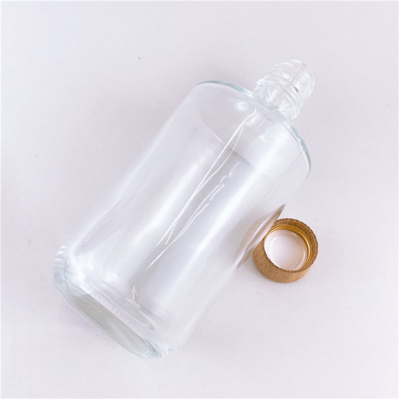 free sample 300ml clear glass round wine bottle whiskey bottle with screw wooden cap high quality food grade transparent bottle
