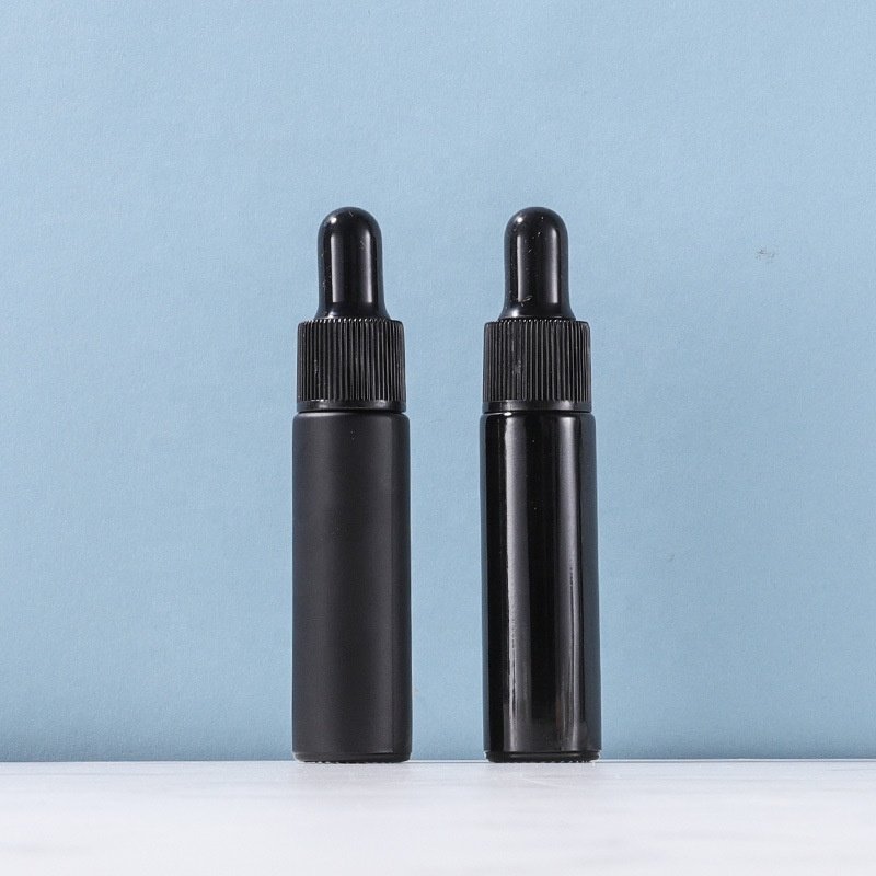 Factory custom empty 10 ml frosted black eyes bead ball glass Essential oil bottle with plastic cap
