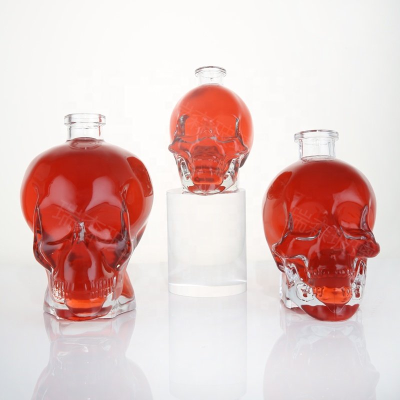Custom unique whisky glass bottles special shape glass skull liquor spirits bottle
