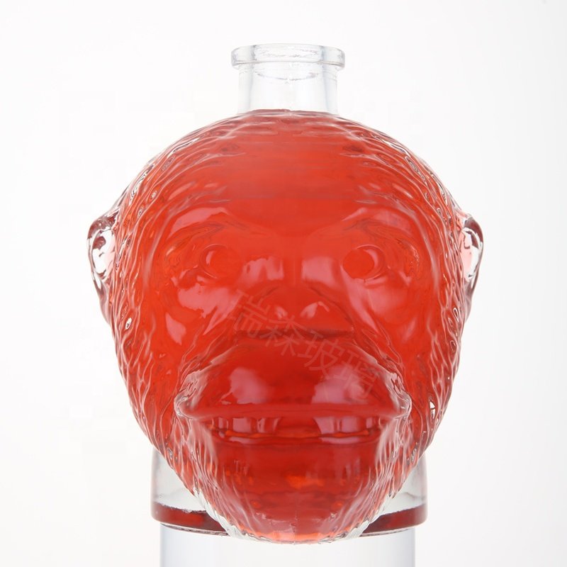 Custom unique whisky glass bottles special shape glass skull liquor spirits bottle