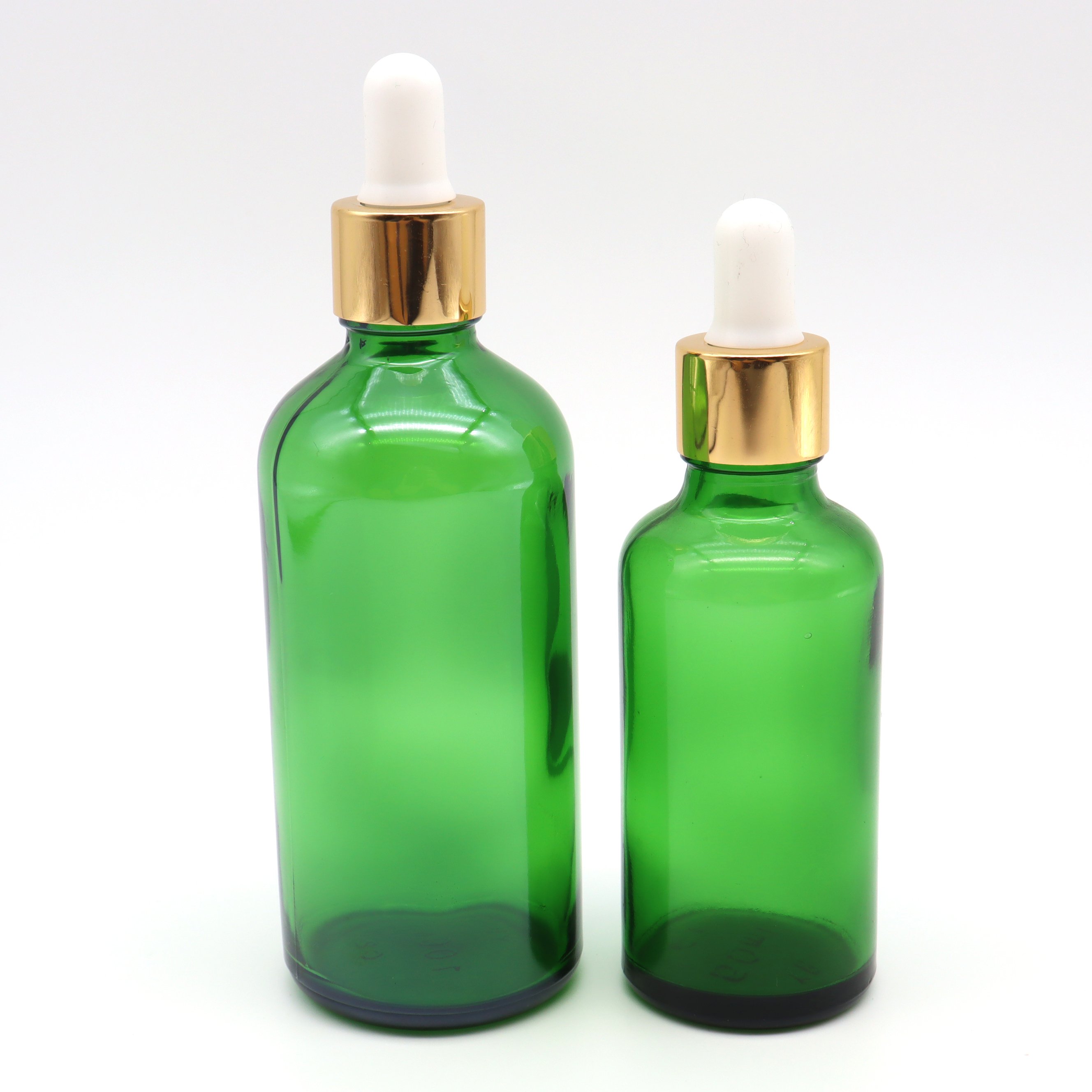 Hot sale green glass bottles Wholesale 5ml 10ml 15ml 20ml 30ml 50ml 100ml green essential oil glass dropper bottle