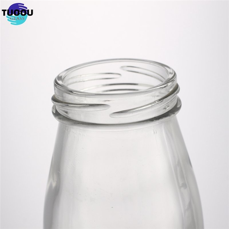 Hot selling drink bottle 200ml 250ml 500ml 1 liter glass beverage wholesale empty milk juice bottles container
