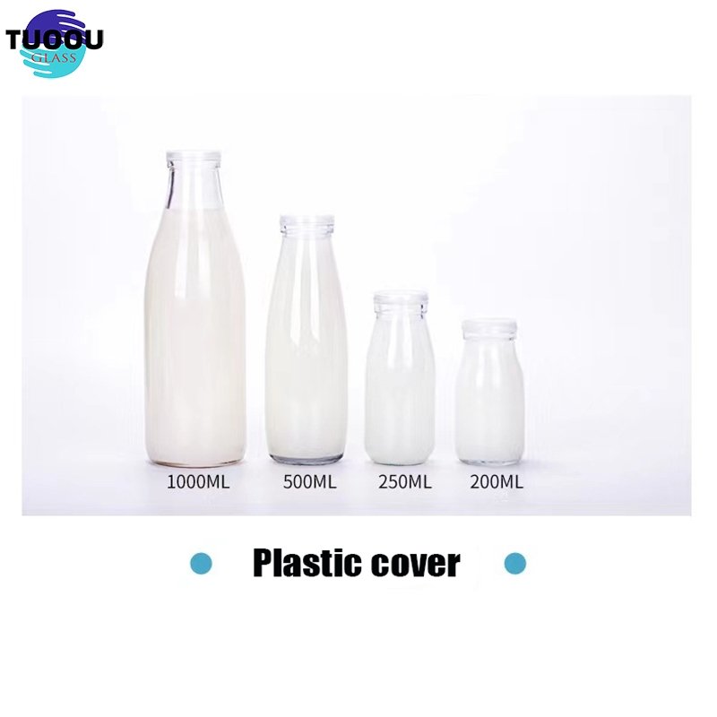 Hot selling drink bottle 200ml 250ml 500ml 1 liter glass beverage wholesale empty milk juice bottles container