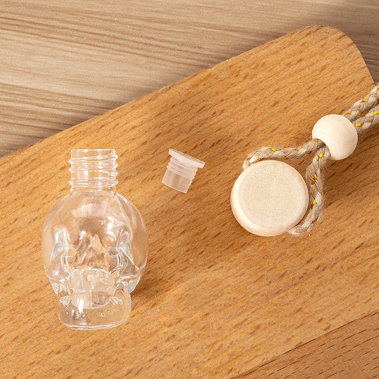 MUB Bulk Hot Selling 8ml Clear Skull Hanging Perfume Diffuser Glass Bottle for Cars