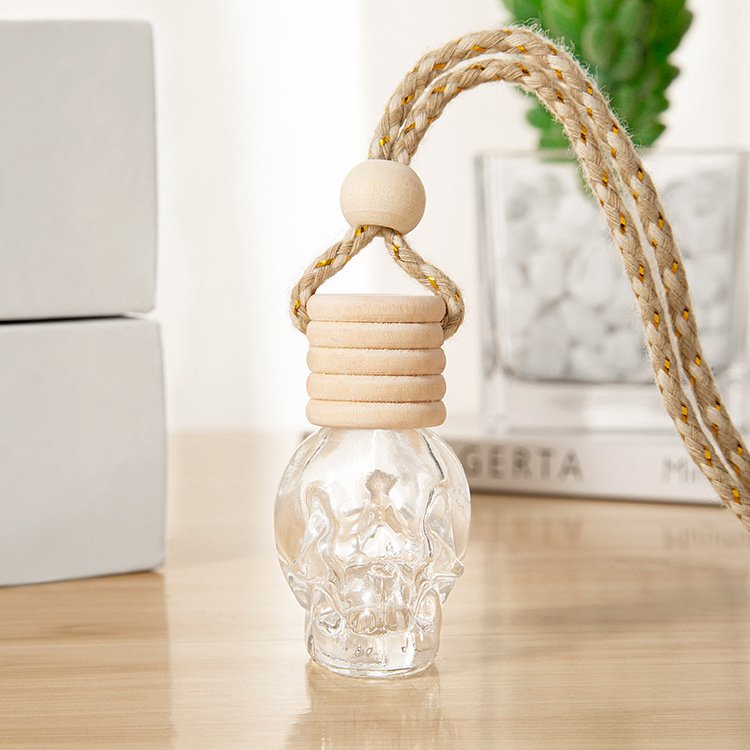 MUB Bulk Hot Selling 8ml Clear Skull Hanging Perfume Diffuser Glass Bottle for Cars