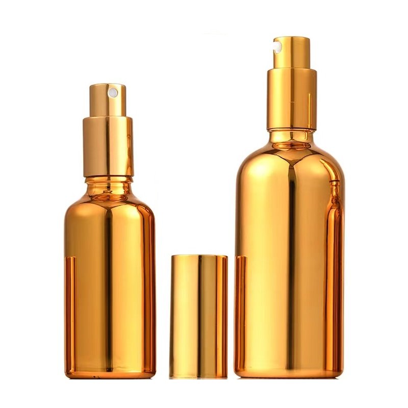 Custom Color UV Gold Essential Oil Bottle 20ml 30ml 50ml Small Gold Bottle Cosmetics Glass Bottle with Gold Lid