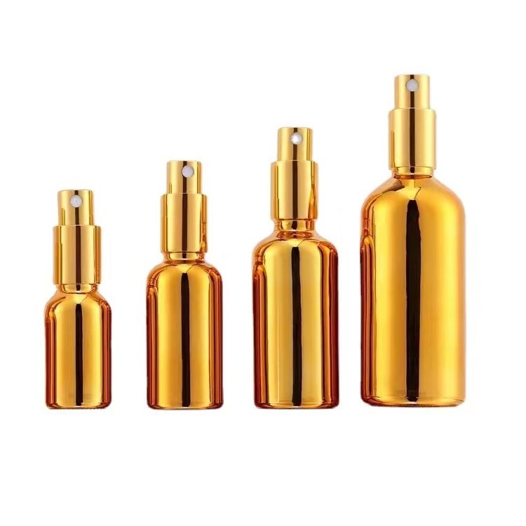 Custom Color UV Gold Essential Oil Bottle 20ml 30ml 50ml Small Gold Bottle Cosmetics Glass Bottle with Gold Lid