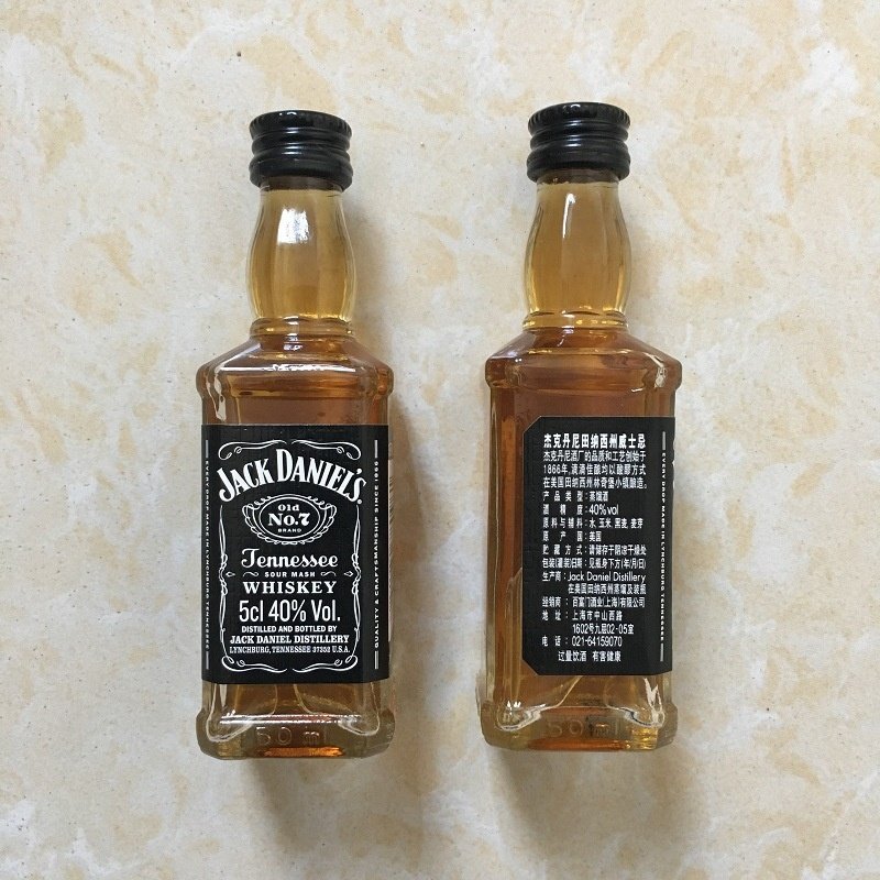 China supply chain Mini glass liquor bottles 50ml customise wine glass bottle 2.5oz glass bottles with screw caps