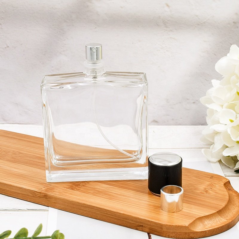 Factory direct sale 50ml 100ml luxury empty transparent square cosmetic bottle perfume glass bottle with pump sprayer