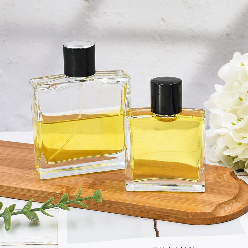 Factory direct sale 50ml 100ml luxury empty transparent square cosmetic bottle perfume glass bottle with pump sprayer