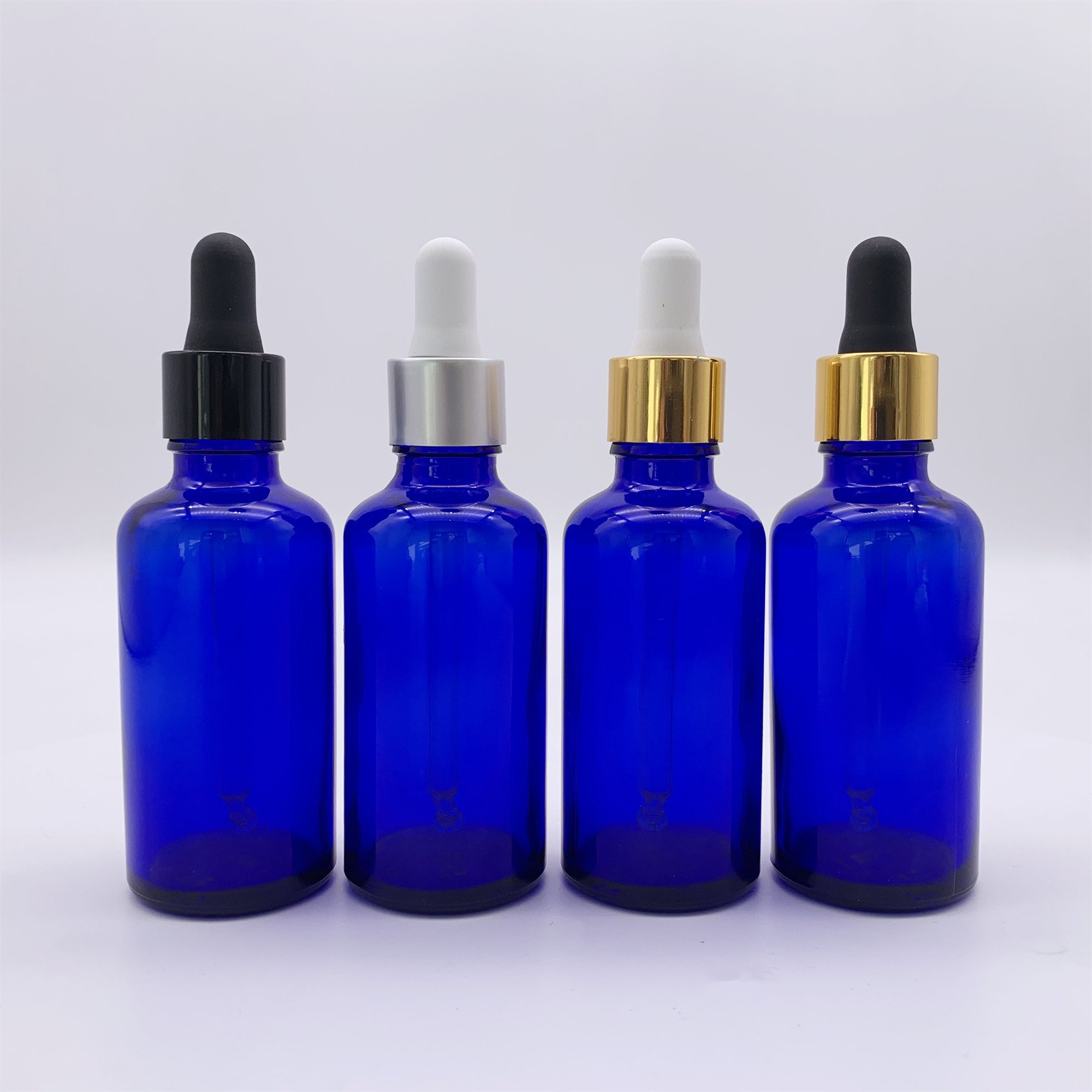 Factory wholesale blue essential oil bottle glass bottle 30 ml dropper bottles