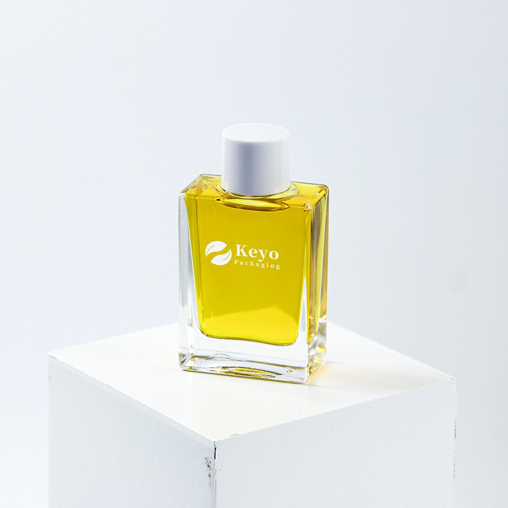 Hot sale Square rectangular 30 50Ml 100Ml Empty clear hair Oil face oil skincare Glass Bottle with white screw cap
