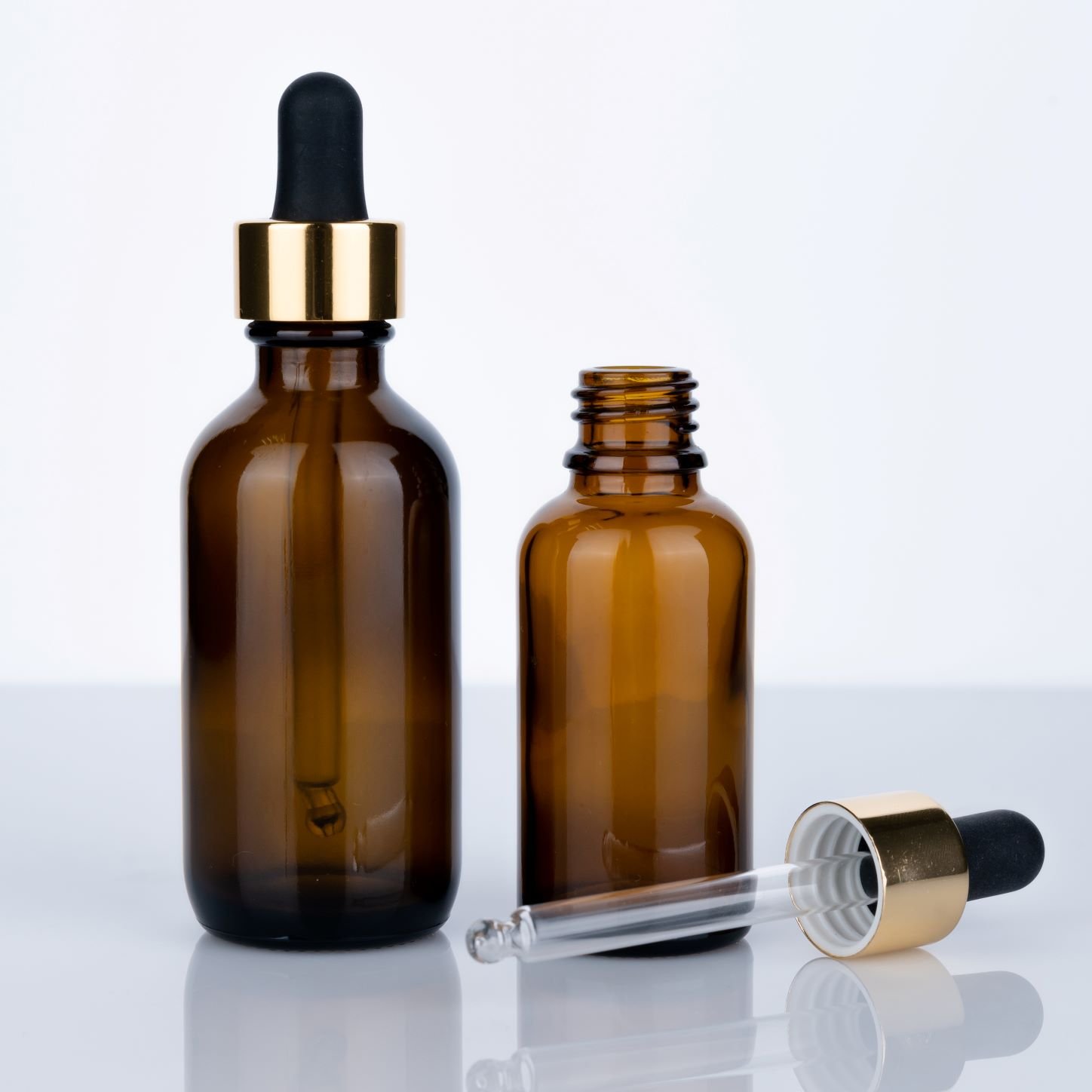 Custom Cosmetic Packaging Amber Glass Bottles for Essential Oils in 60ml 30ml 20ml 10ml and 5ml Sizes for Luxury Products