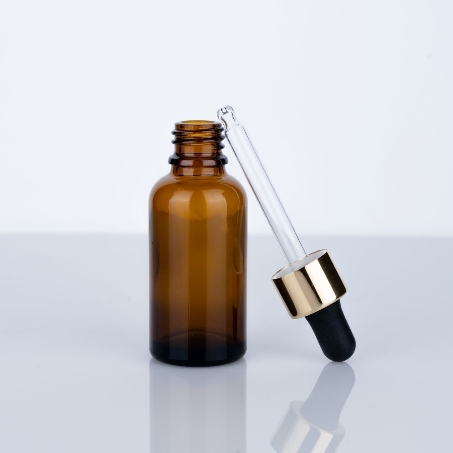 Custom Cosmetic Packaging Amber Glass Bottles for Essential Oils in 60ml 30ml 20ml 10ml and 5ml Sizes for Luxury Products
