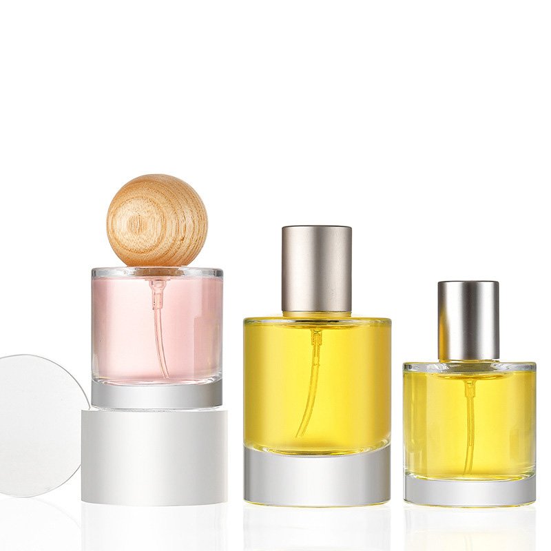 New Style 30ml Luxury Glass Perfume Bottle Cylinder Shape 50ml Clear Spray Glass Bottle With Wooden Lid