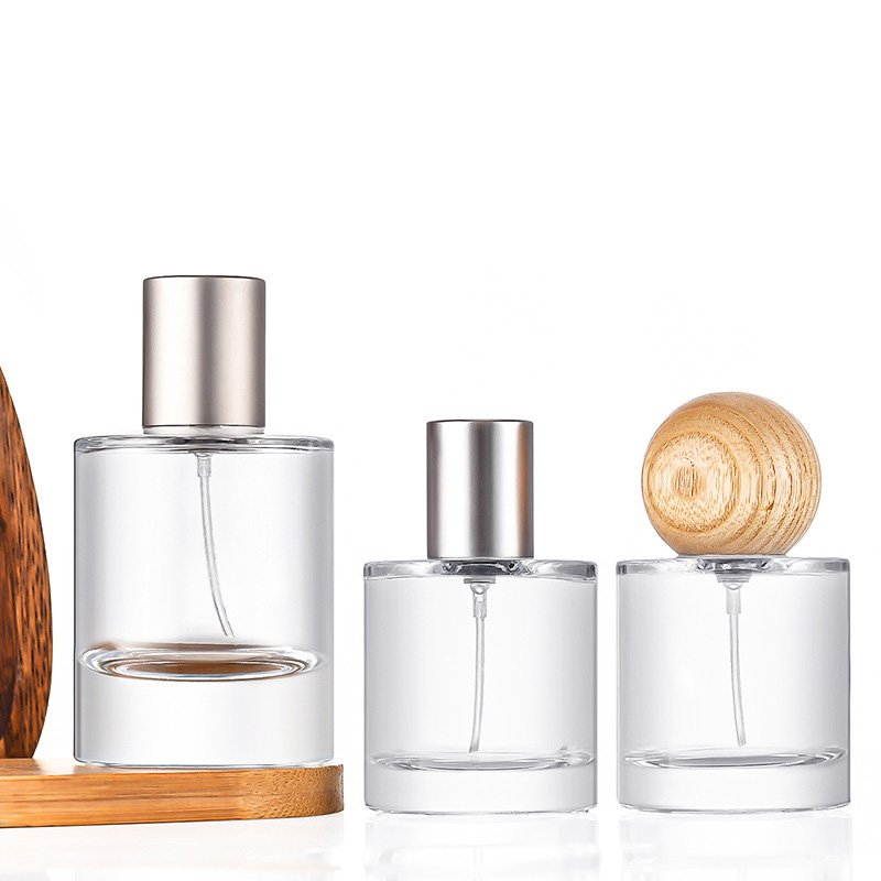 New Style 30ml Luxury Glass Perfume Bottle Cylinder Shape 50ml Clear Spray Glass Bottle With Wooden Lid