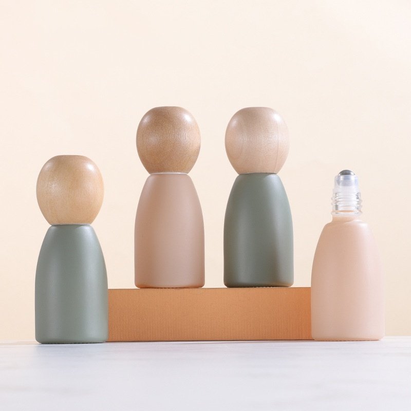 wood Ball cap Morandi color empty refillable glass bottle with metal roller ball roll on bottle 10ml essential oil glass bottle
